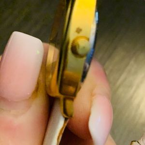 Triumph watch with white leather band!